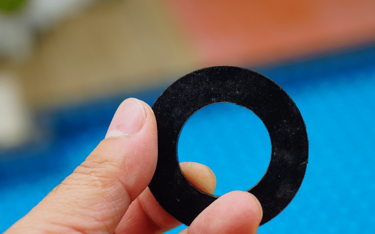 hand holding a rubber gasket